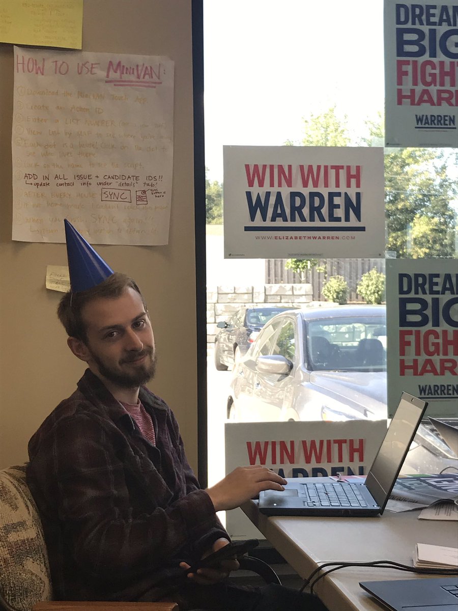 gabi_ampuero's tweet photo. Seth is wearing the official Elizabeth Warren volunteer uniform: a smile and a party hat! #3nergy https://t.co/CFNkq2mlfY