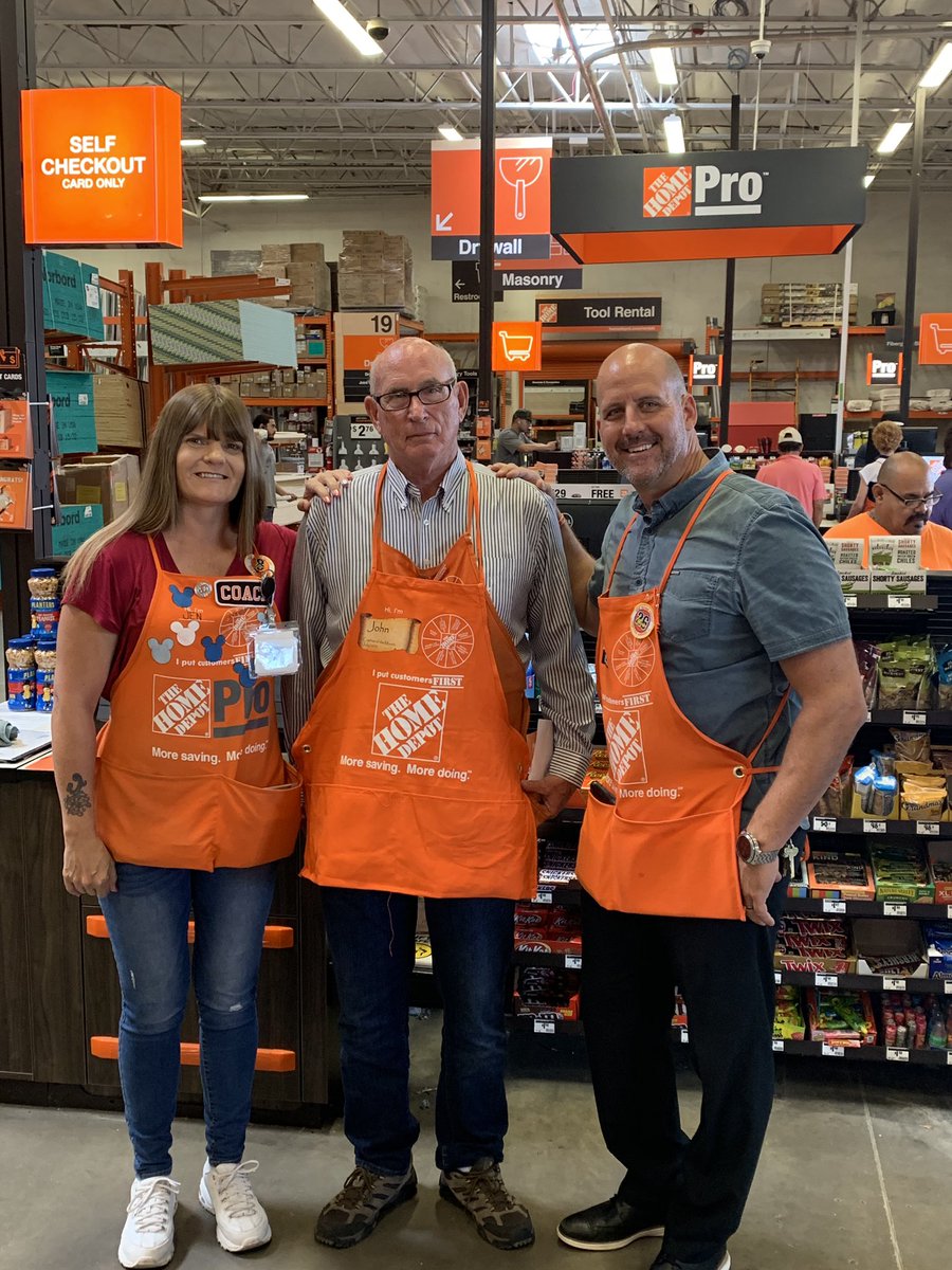 Corey and Jen congratulating John on earning Cashier Of The Month... Great Job John you rock!!