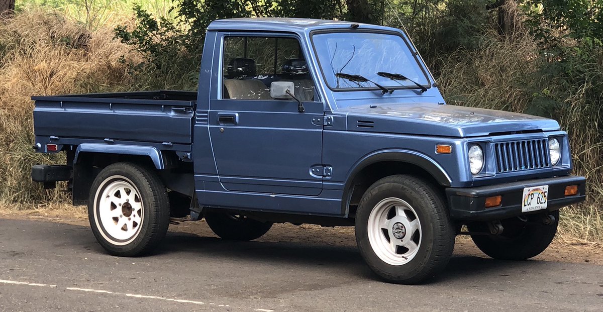 RadMauiRides's tweet photo. Cool #Suzuki truck with the fold down sides for the flatbed effect...most definitely a #rad #maui #ride https://t.co/92ujT0X0Ej