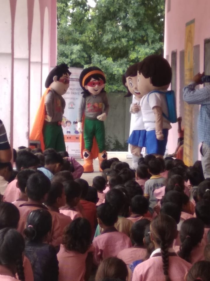 DaburIndia's tweet photo. Food Safety and Standards Authority of India #FSSAI, along with #Dabur, conducted an awareness programme at Govt Junior School, Chauna, where #SNF #Mascots #MasterSehat and #MissSehat spread #awareness about safe and nutritious food.
#CSR #Superheroes #Nutritious #food https://t.co/1fyxlZgchv