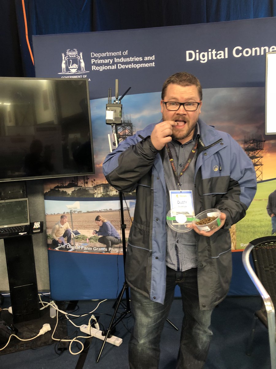 DPIRDbroadacre's tweet photo. DPIRD’s Dusty Severtson, of Northam, supporting one of the startups displaying at Techspo, in Wagin, ‘Grubs Up’ that produces roasted crickets, which contain about 65 per cent protein! #pestfaxmap #dpirddigital https://t.co/1lXLMxlJju