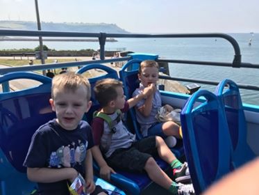 OceanCitySights's tweet photo. 😎 Thanks to Jan Lake for sharing this wonderful picture of her three lucky grandsons on board the top deck. The boys loved their day out on our big blue bus! 💙 https://t.co/uzmY4JlM7o