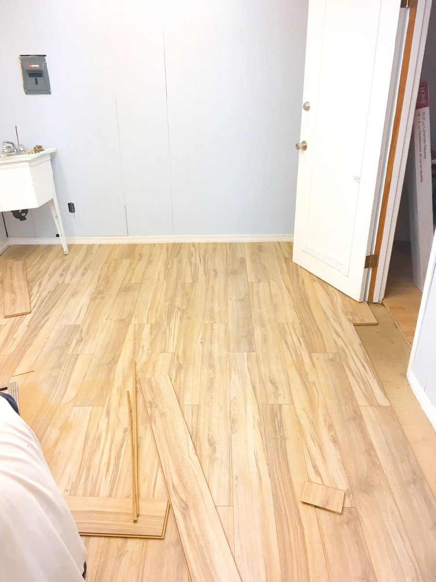 DesignBlush's tweet photo. #MidWeekMakeover - installed some beautiful rustic click flooring into one of the spaces we helped design.  The best part? We found it on sale :) https://t.co/DEnhrikRcS