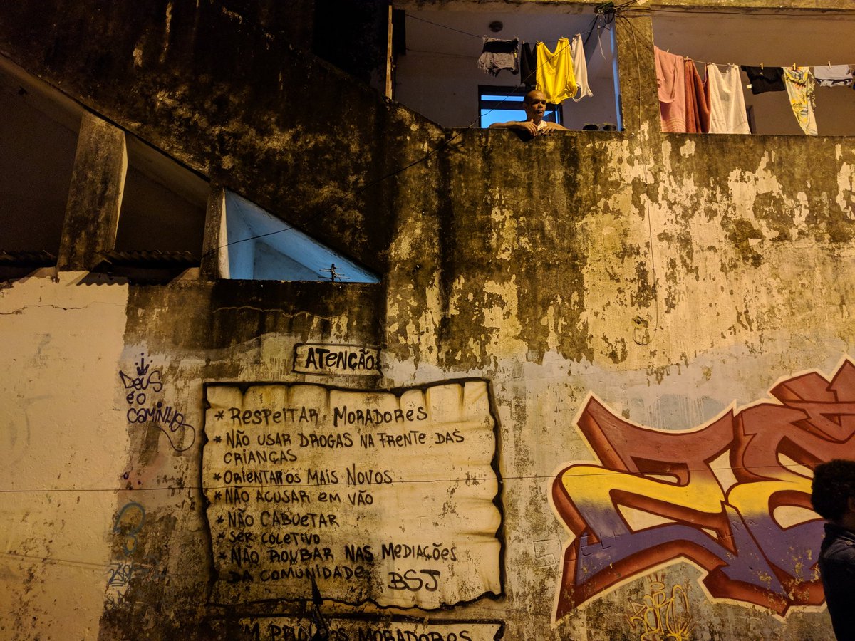 Some Criminal Governance fieldwork almost-live-tweeting, at  @cblatts suggestion, from João Pessoa, Brasil, where I visited a neighborhood dominated by the Okaida prison gang last week. THREAD