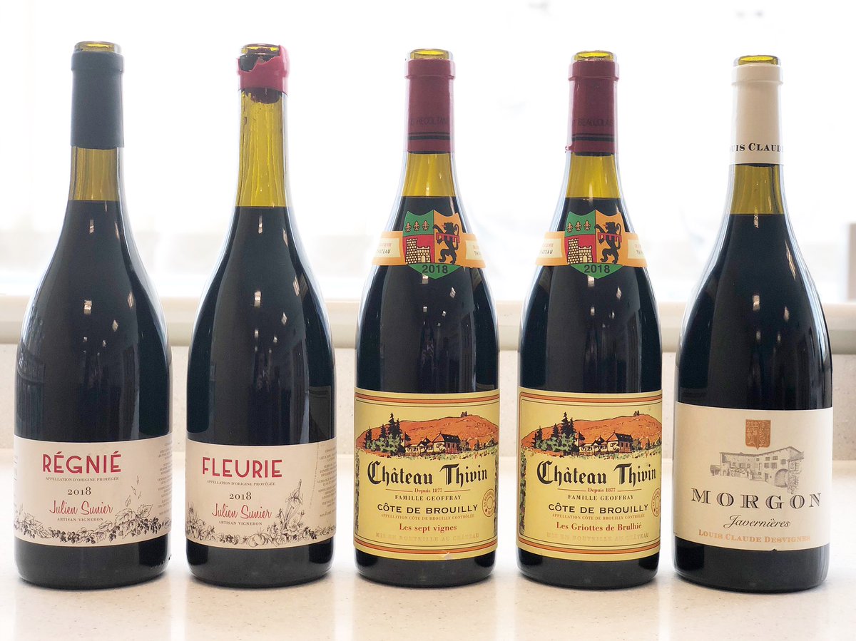Lenkster's tweet photo. Bit of 2018 Beaujolais action today at the office. Bottled deliciousness basically. Now what to buy. Everything? 🤔#beaujolais #juliensunier #chateauthivin #desvignes #morgon #fleurie #regnie #cotedebrouilly #wine https://t.co/ptR0KuaCEn