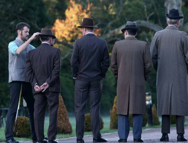 DowntonThomas's tweet photo. Did I mention there was a Full Monty scene in the #DowntonAbbeyfilm ? Here's the fluffer working his way down the line. #DowntonAbbey https://t.co/bZy6s7WwfR