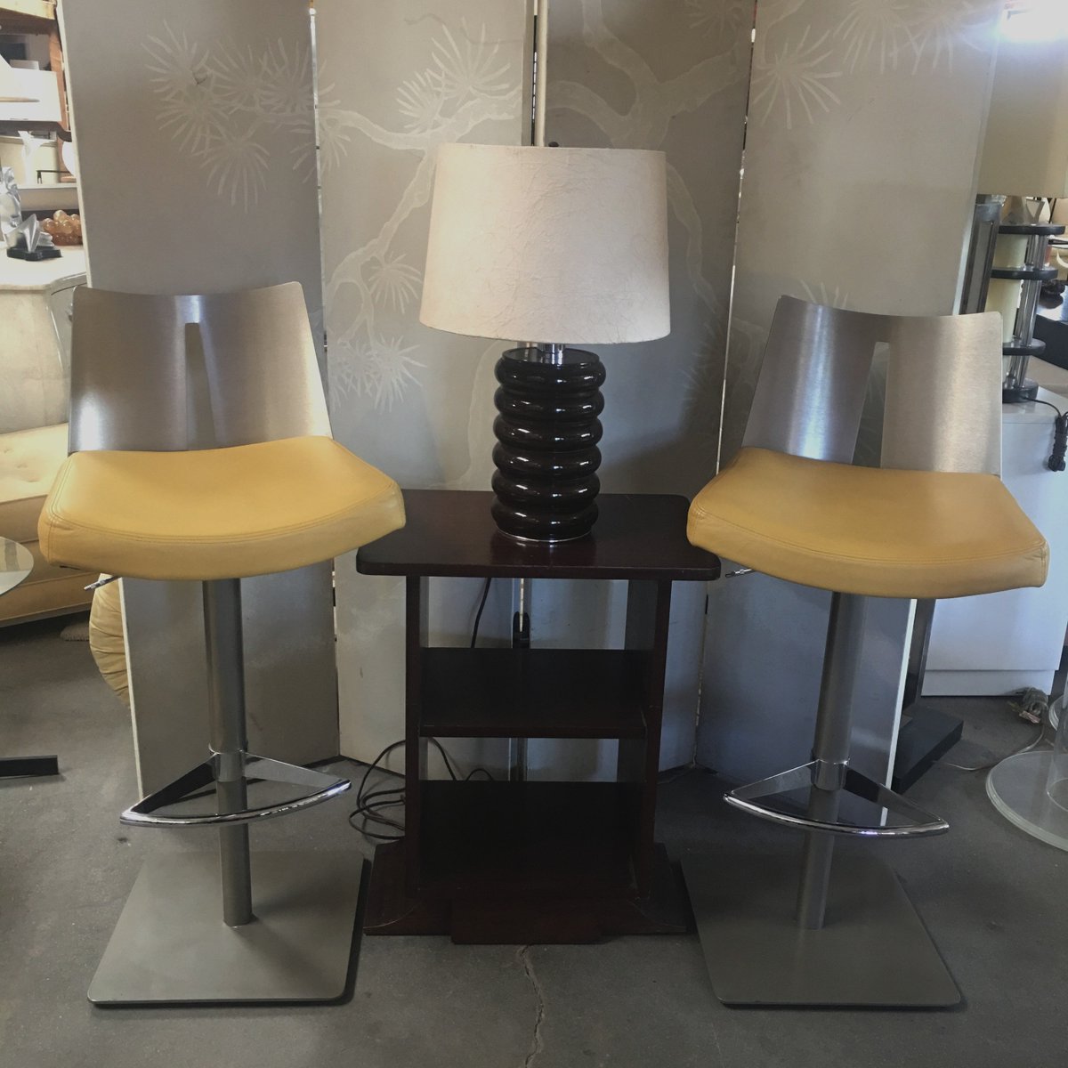 galeriesommerla's tweet photo. Pair of height-adjustable swivel bar stools. To adjust the height of the stool, the bottom part under the footrest, becomes shorter. 
Grey powder-coated steel base and column. Shiny polished steel footrest and handle. Mustard-Yellow leather seats with brushed steel back https://t.co/I1RefKDIyw