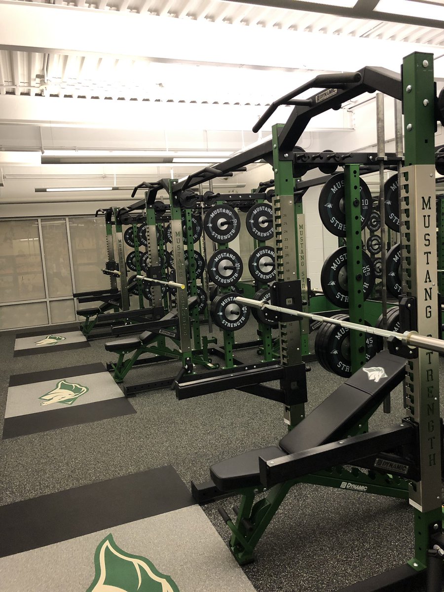 MvilleMustangFB's tweet photo. One week from today the 2019 Mustangs report to campus. They will be greeted with a newly renovated and brand new weight room complete with top of the line equipment. A great time to be a Mustang! #MustangGrit https://t.co/x1wv15GZAb