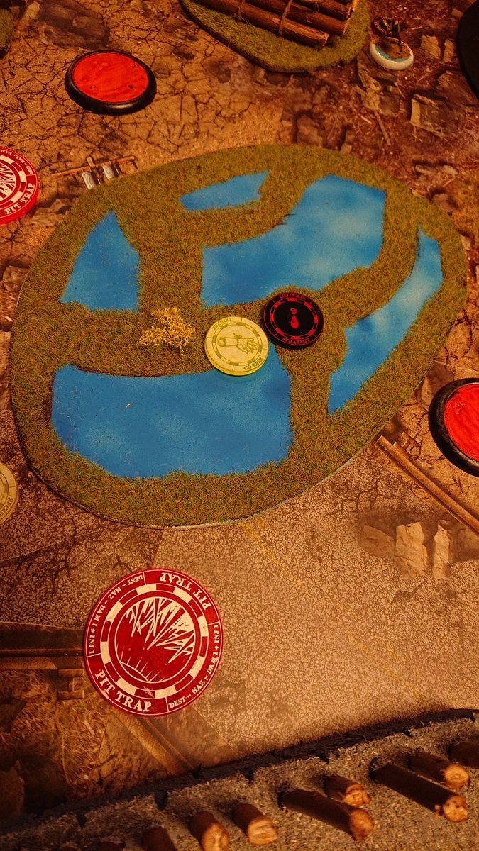 T2 sees the first death. Bandido drops a bomb, then gets dropped by a clockwork rifle. <a href="/AOWStudiosUK/">Art of War Studios</a> looking well on the table.