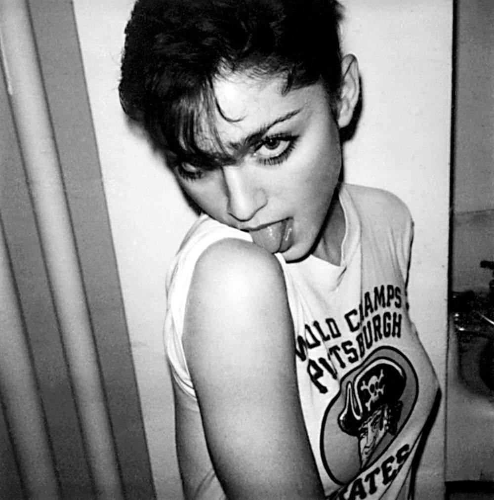 OddPittsburgh's tweet photo. A 22yr old @Madonna rocking a #Pittsburgh @Pirates Pirates shirt in 1980. 

Photo by @TheRealMickRock https://t.co/IEJxXLb8Lh