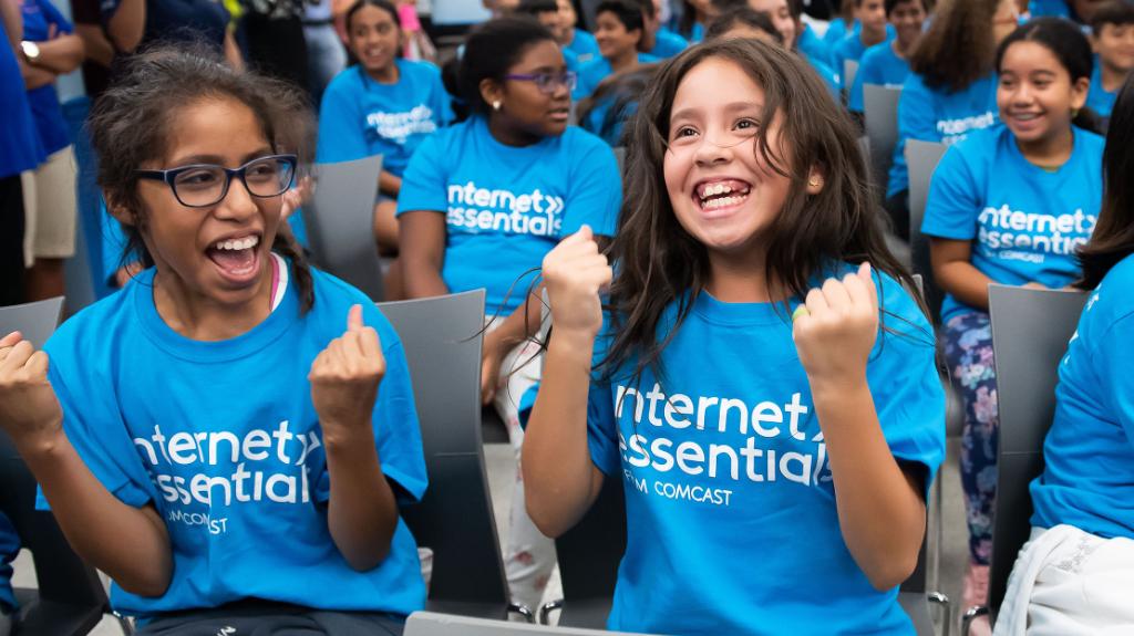 ComcastFL's tweet photo. The AMAZING moment in Miami yesterday when more than 100 @amigosforkids campers learned that they now each have a brand new laptop from @Comcast #InternetEssentials so they can be ready to head back to school.  #ReadyForAnything https://t.co/mf62nSqrj8