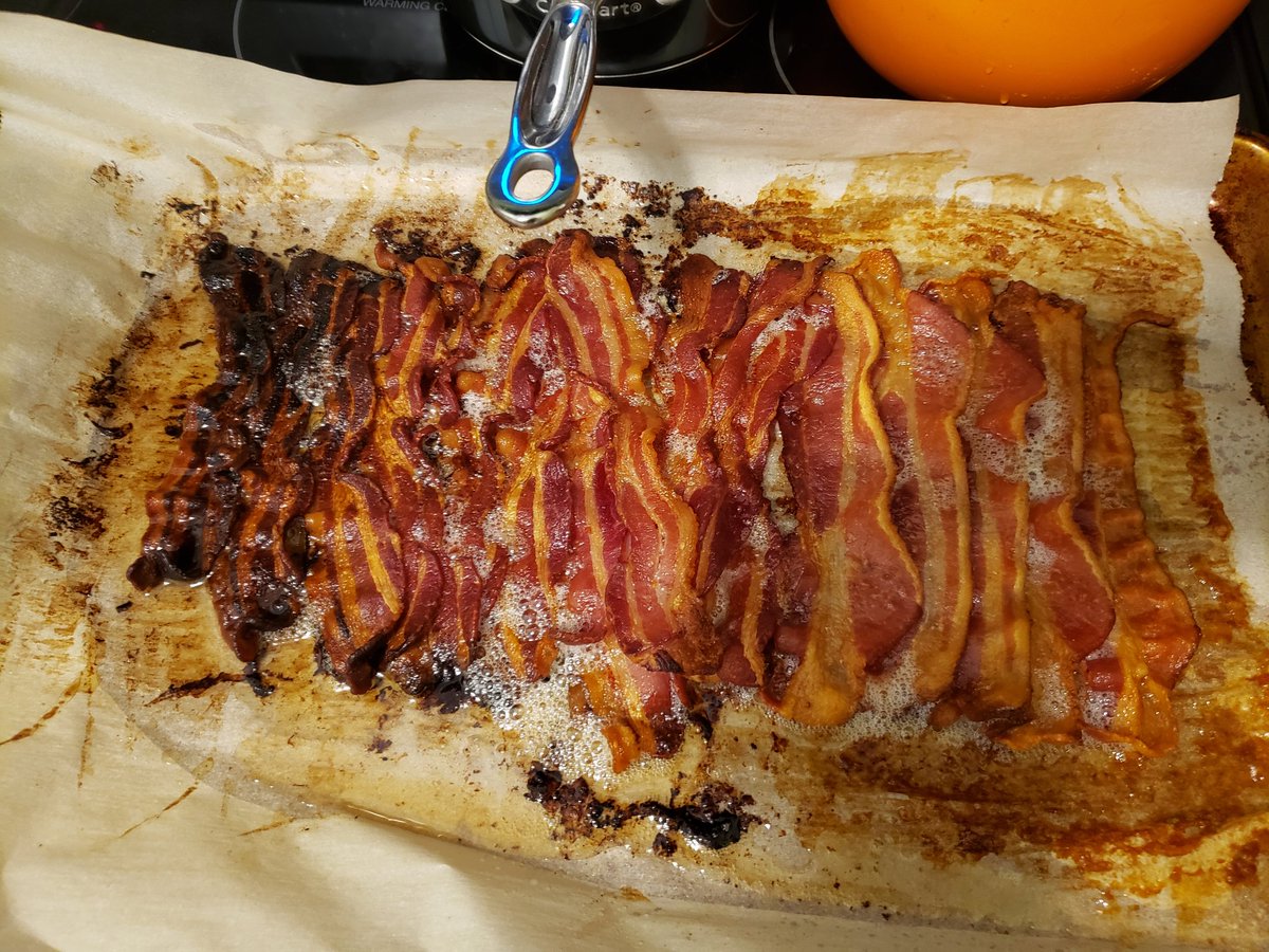 kinzelane's tweet photo. I have mad bakin bacon (hehe) skills. Burnt to crispy to chewy: every taste profile represented in one pan. #breakfastqueen https://t.co/0TZjW38gY1