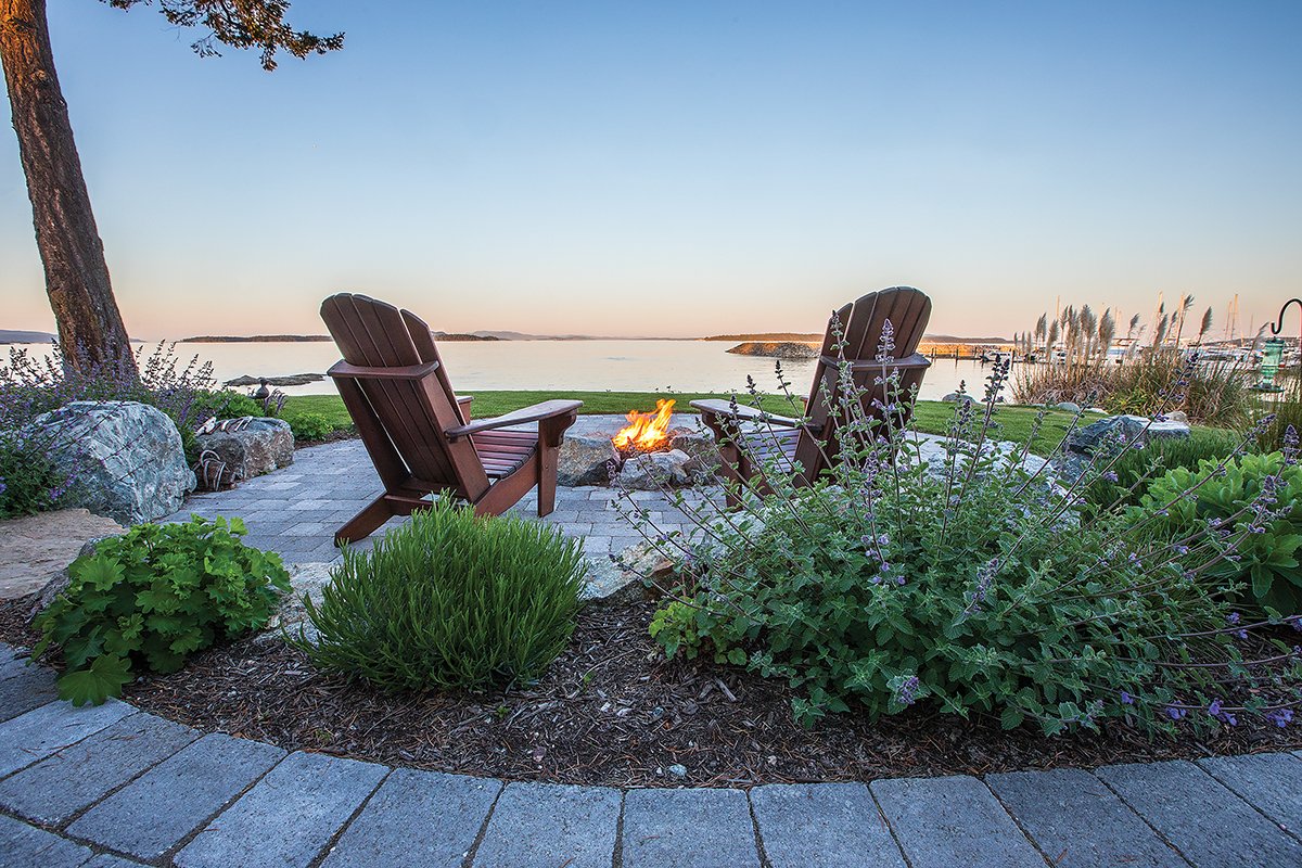 This view has us speechless! 

Pacific Ridge Landscapes chose hearty plantings that could handle the sun and wind. Each planting, including lavender, Salvia and Nepeta, attract bees and pollinators. The layout was designed to invite guests to linger and enjoy the view.