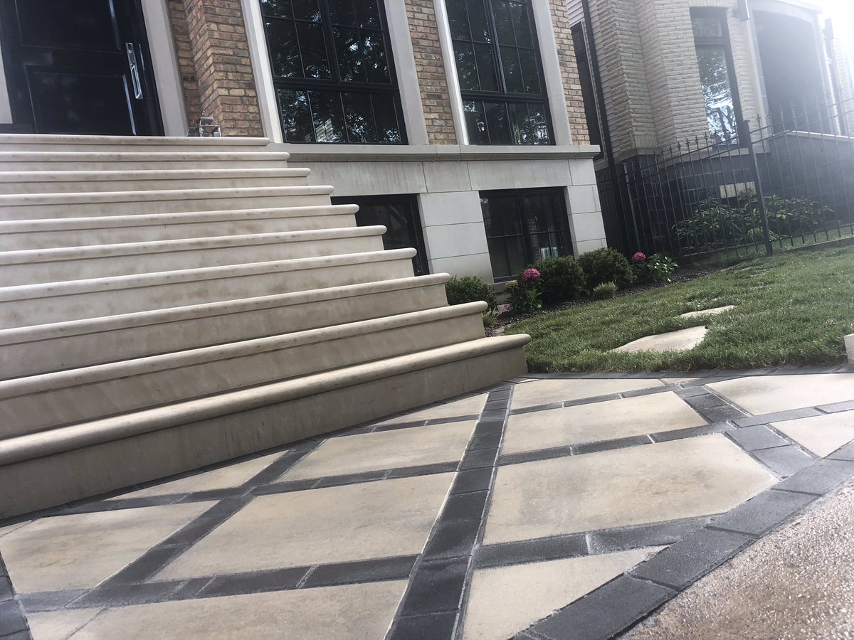 DutchBarn's tweet photo. Workin’ til 5 in the city today! This modern walkway turned out nothing short of amazing, thanks to our creative and talented crew! 
#citylife #modernwalkway #amazing #techobloc #blu60 #cleanlines #paverdesign #geometricpatterns #paverwalkway #weloveourcrew #dutchbarnlandscaping https://t.co/jgrck0TfiB