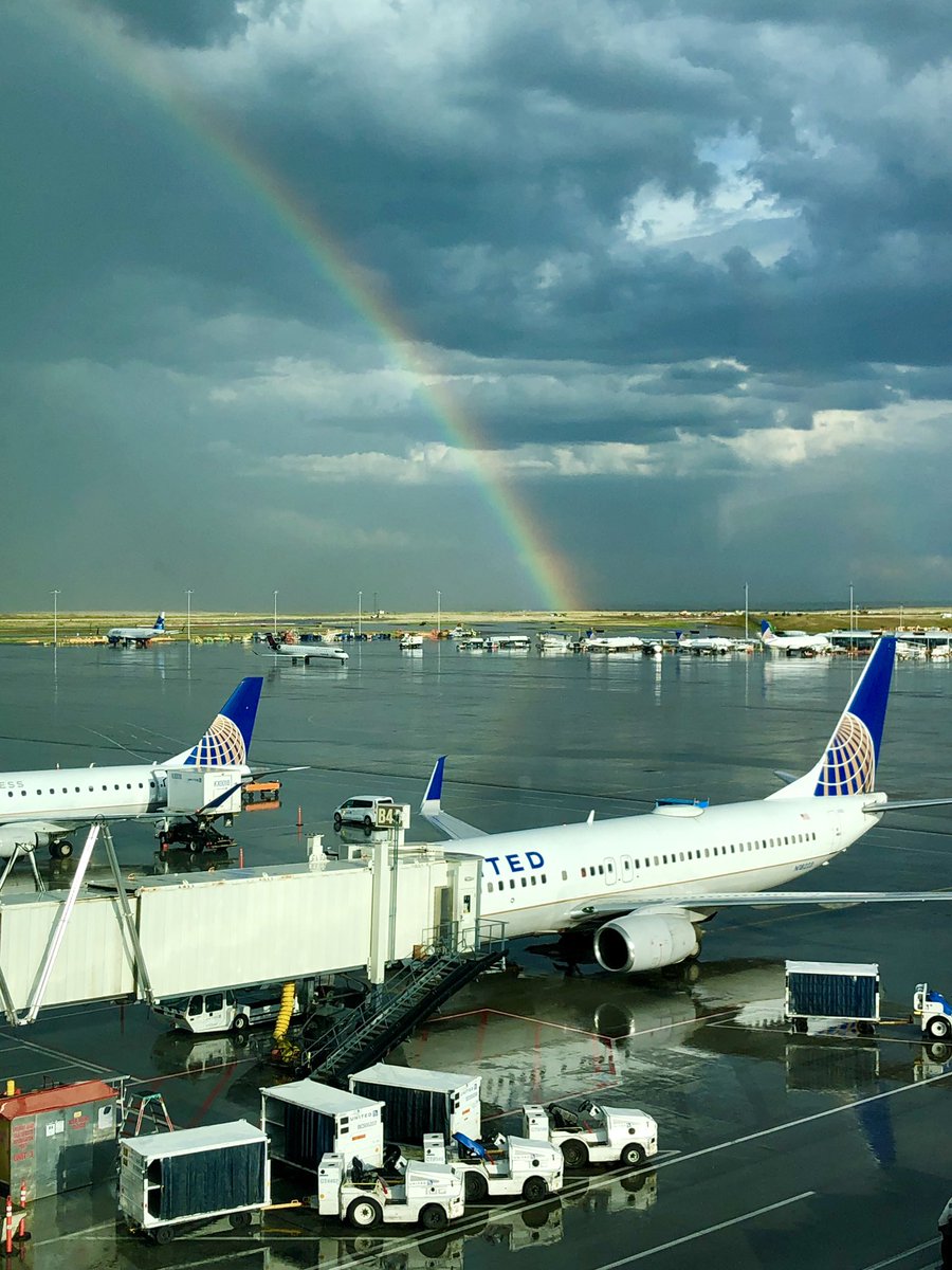 Rob_Coggin's tweet photo. Awaiting my turn to slide down the rainbow at DIA! @DENAirport @UnitedAirlines @united https://t.co/K6wX7jzDX7