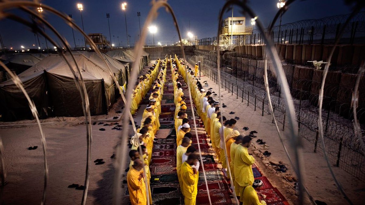 Prayer in Camp Bucca (2003-2009) in Umm Qasr near Al-Basra, Iraq.This is where the leadership of the Jihadist Insurgency got its start.