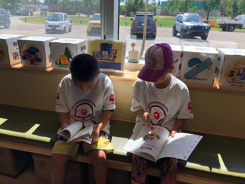 ArcolaDragons's tweet photo. A visit from local author Lori Burton, delicious lunch from Denny's, a trip to @OfficialRPL and fun in the park? #CampDragon had a GREAT Day 3! @UnitedWayRegina @RegPublicSchool https://t.co/NiO5XGpCJT