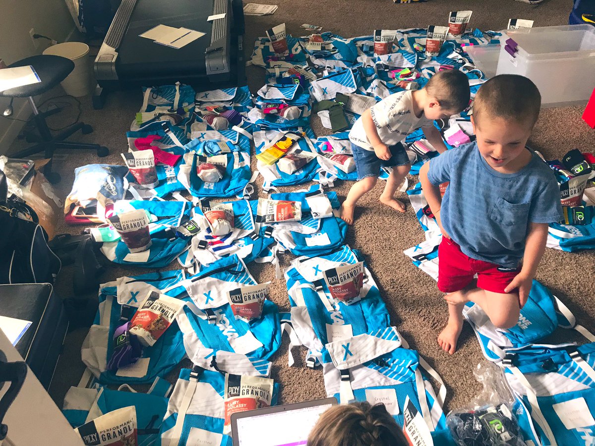 stephandbenB's tweet photo. Prepping swag bags for #Brucecamp. Sorry if you’re missing an item, Hudson might have stolen it. https://t.co/oIM3UvHQsx
