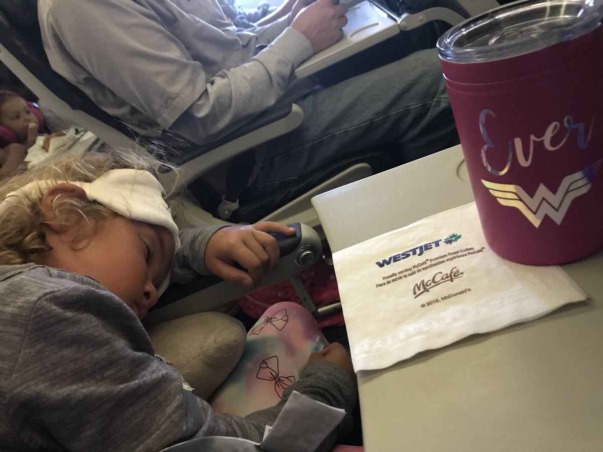 WilsonLynBurke's tweet photo. Best flight home to Toronto. @GameOfThrones on the Westjet app. Kids slept. And complimentary wine from Westjet. Thanks @WestJet for being awesome 😃 https://t.co/1MAxH00mtC