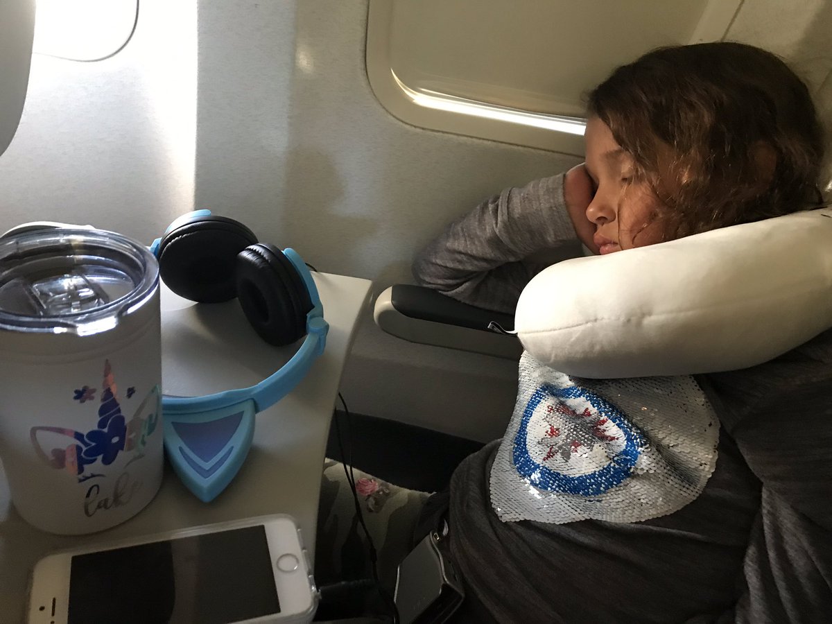 WilsonLynBurke's tweet photo. Best flight home to Toronto. @GameOfThrones on the Westjet app. Kids slept. And complimentary wine from Westjet. Thanks @WestJet for being awesome 😃 https://t.co/1MAxH00mtC
