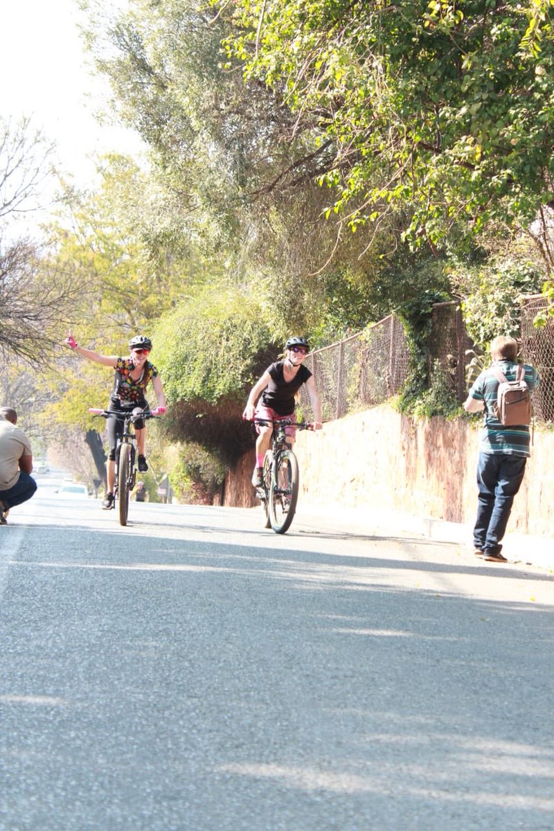 Hollard's tweet photo. King of the Mountain! Checking out our city by bike. Join us for the #HollardJUMA2019 on the 25th August @JUMAMTB #hollardjozitrails #betterfutures https://t.co/5SsyX77vNx
