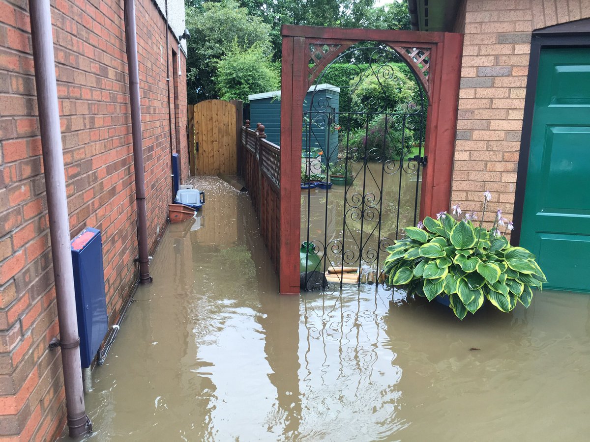 scg_small's tweet photo. @transcotland this is the drainage ditch for M90 beside houses at Kirklands Park Grove, Kirkliston. It’s ineffectiveness caused flooding so severe around our houses the fire service had to pump it out. This needs urgent attention today to prevent it from reoccurring tmrw &amp; Sat. https://t.co/EU7V4huFxf