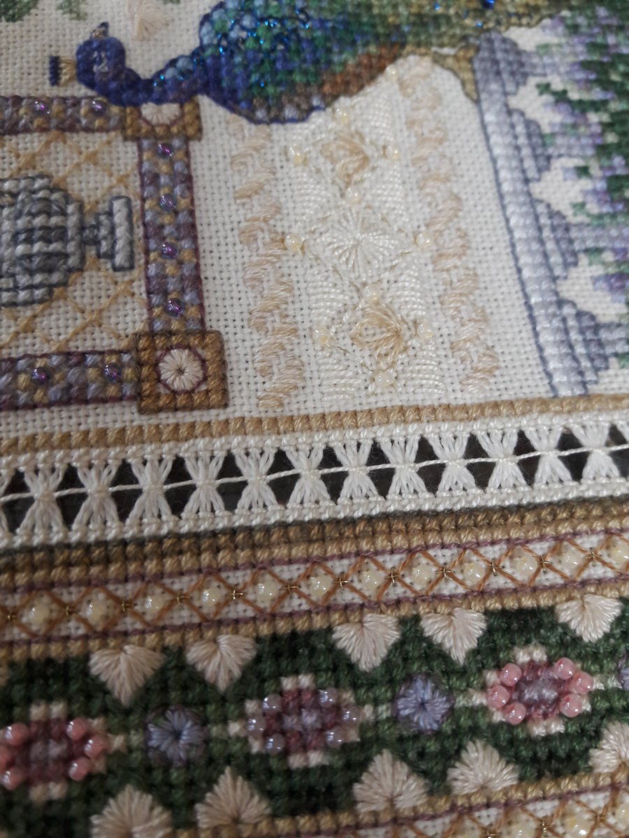 shericobbsouth's tweet photo. A few close-ups of my (ahem!) Grand Champion sampler, showing details of the beadwork and the whitework, and the cutwork while it was still in progress. #embroidery #crossstitch #cutwork #countyfair #larimercountyfair #artsandcrafts #whatidowhenimnotwriting https://t.co/4eZW5ojs8C