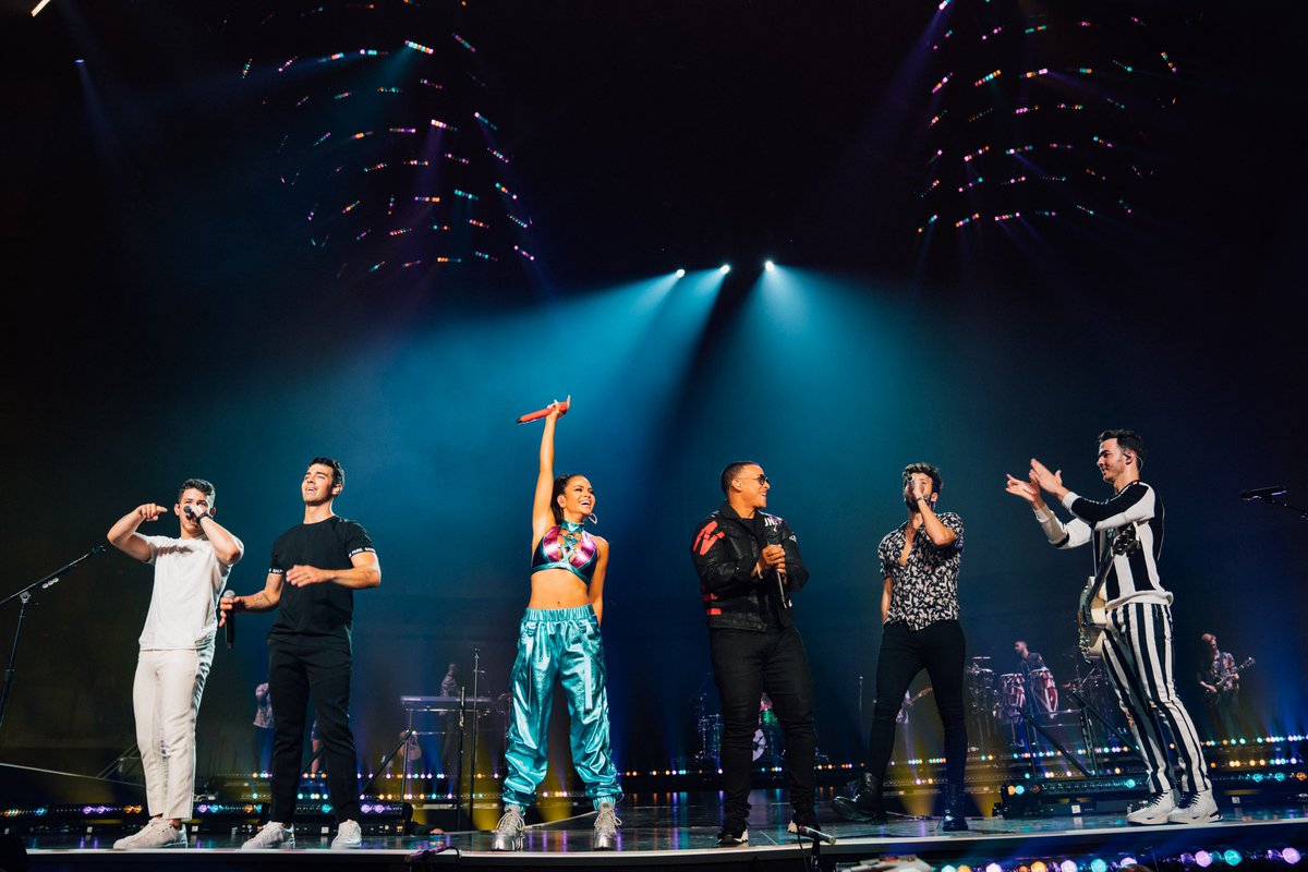 jonasbrothers's tweet photo. First surprise from the #HappinessBeginsTour... #Runaway in Miami 😎 Big thank you to @daddy_yankee @SebastianYatra @NattiNatasha for coming out!! https://t.co/3dUaRXfoBw