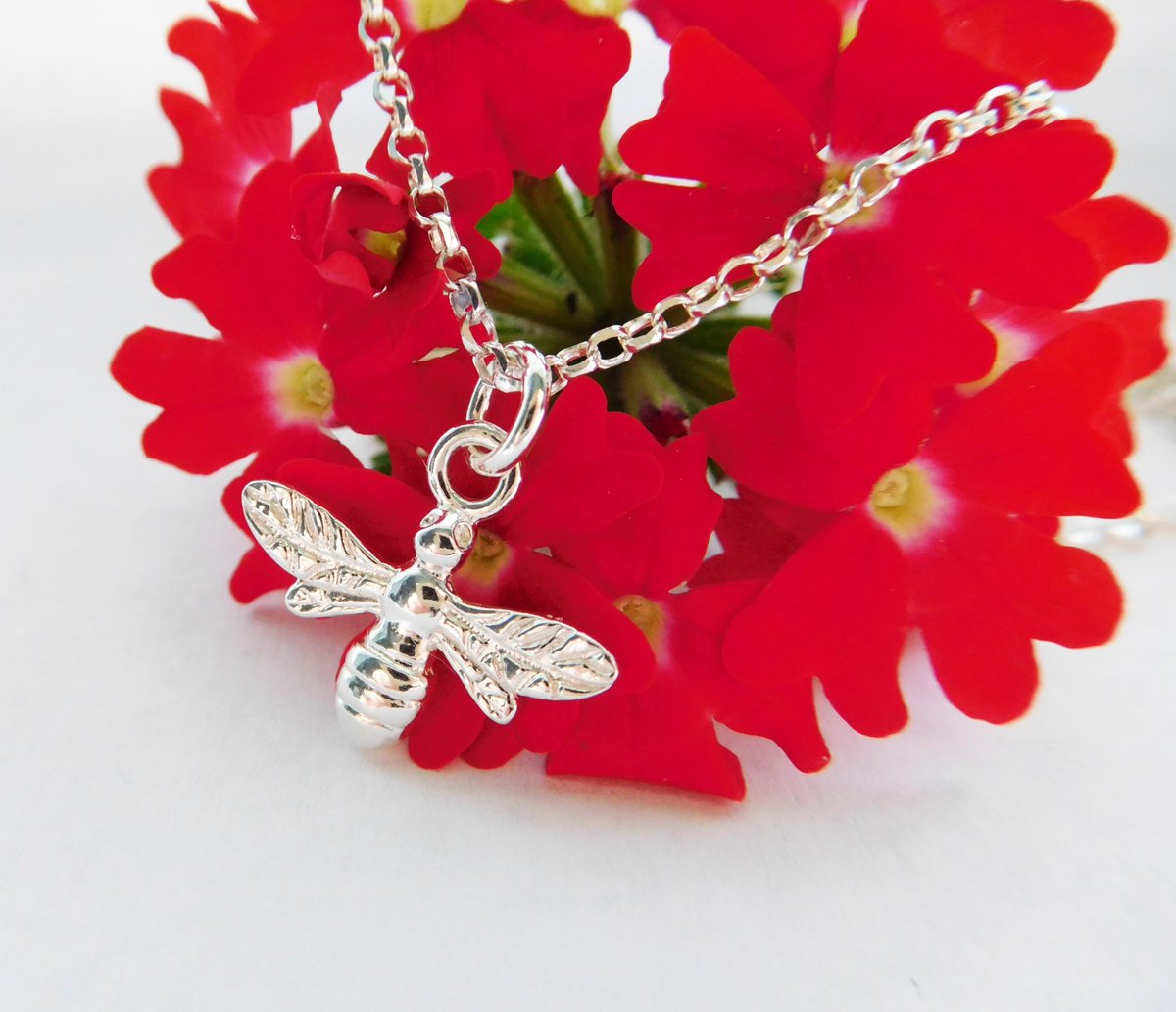 Are you known as a busy bee?  Always rushing about?  Time to relax!

This beautiful #beependant is made of #sterlingsilver on a silver chain.  Gift boxed, UK delivery included.  Available in my #etsyshop - click on the link above.  

#earlybiz #beejewellery #womaninbiz