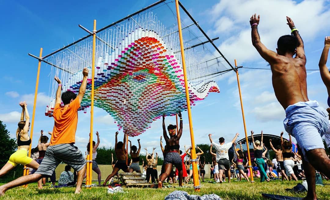 BlackFemArc's tweet photo. 1,600 plastic bottles formed a wavy canopy projecting sunlight through coloured water to create an incredible multi-coloured mosaic mural @BrainchildFest. Who created this might you ask? Our incredible BFA committee member Seyi Adele and we're in absolute love 💕 https://t.co/6GSfy8UX1z
