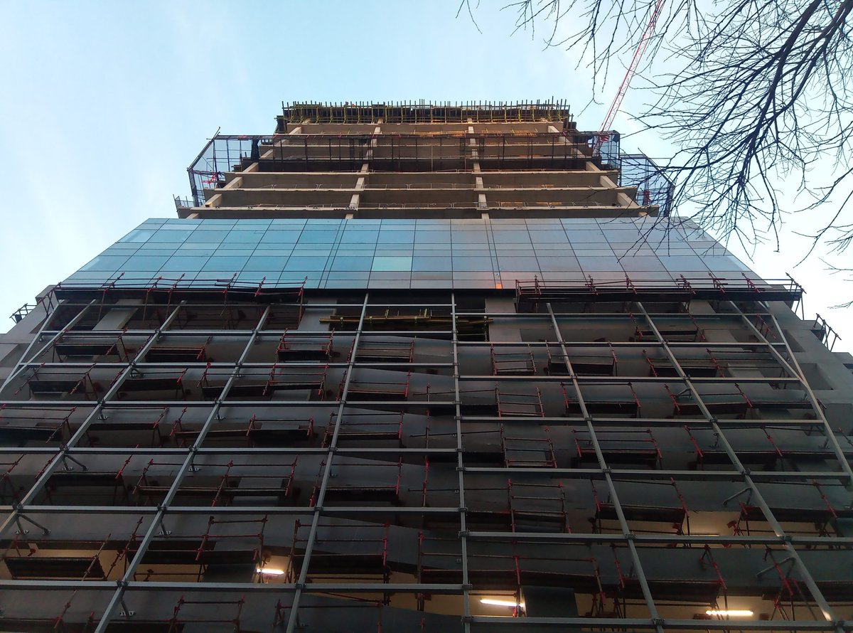 InfoSutherland's tweet photo. The dynamic form of DHK Architects design for ABLAND’s 35 Lower Long Project, is quickly taking shape as the facade installation progresses. #DHKArchitects #Abland #SutherlandEngineers #FacadeEngineers #OptimalEngineering https://t.co/KWSDXcwEQa