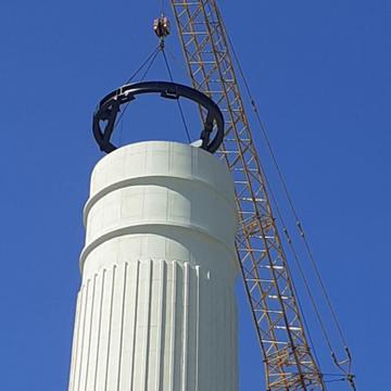 MaceGroup's tweet photo. At @BatterseaPwrStn, construction has officially started on The Chimney Lift. Once the project is complete, visitors will be able to have a 'Charlie and the Chocolate Factory' experience, travelling 'up up and away' to the top of the north-west chimney for 360-degree views. https://t.co/6EOSp2mmE2