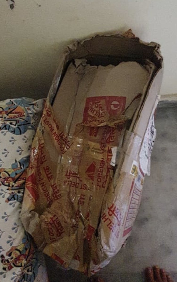 tweetcloudtalk's tweet photo. @IndiaPostOffice , this is how an international parcel by speed post was received. Then Box could have been easily opened and parcel inspected for customs if needed, but seems like someone was in a hurry to tear the box open. Never using India post to send to India again. https://t.co/4FCHLx71mz