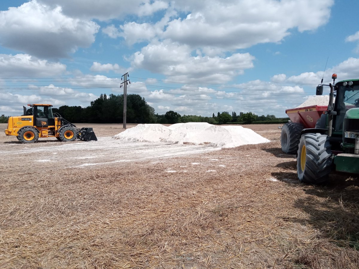 Hard at it correcting soil pH levels before the rain arrives later. #Farm24