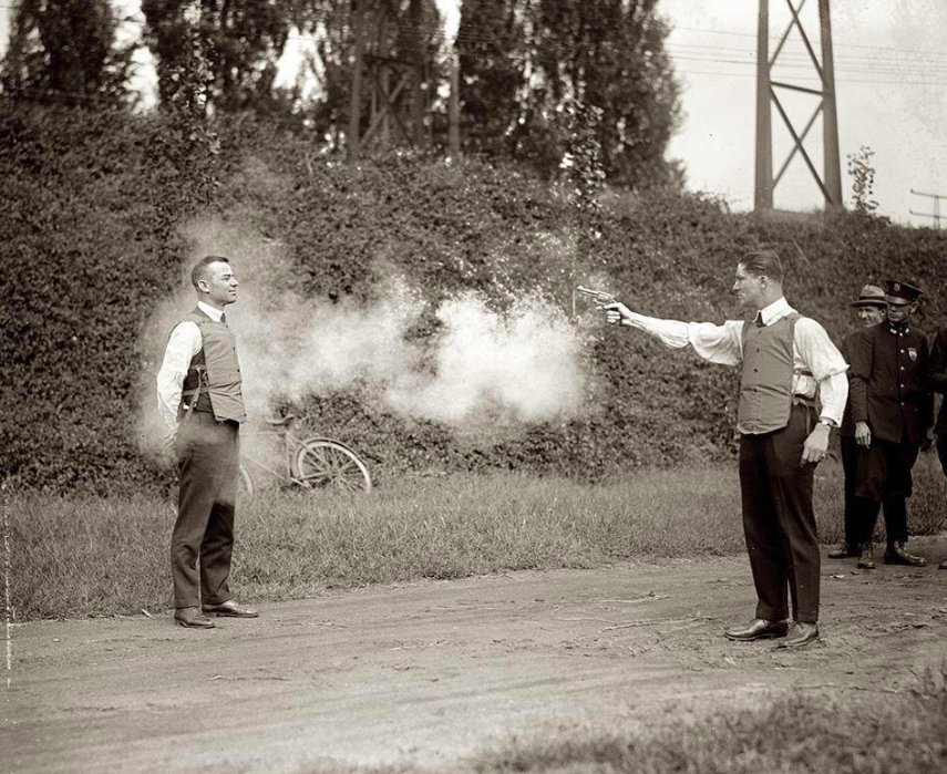 Testing a bullet proof vest c.1923