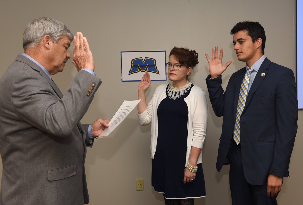 MSU_President's tweet photo. Thank you to Judge Executive Harry Clark for swearing in our two newest Regents - Dr. Annie Adams and Mr. Colby Birkes. https://t.co/ZGHhxVrofr
