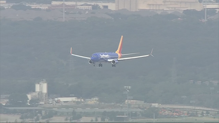 FOX4's tweet photo. Southwest captain Bryan Knight was just 5yo when he said goodbye to his father at Love Field. Air Force Col. Roy Knight Jr.'s fighter plane was shot down during the Vietnam War. Today, Knight finally brought his father's lost remains back to Love Field. https://t.co/jZZpfjfRzO https://t.co/yP0yPhnopX