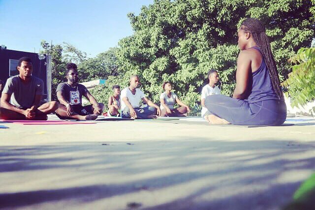 banjHT's tweet photo. This will go down in history as the very first time @banjht opened up its rooftop for a YOGA & MEDITATION SESSION with Nzingah Oniwosan. Thanks to @papstartupweek! #papsw2019 #meditation #Yoga #Haiti https://t.co/bF4HUNeMGP