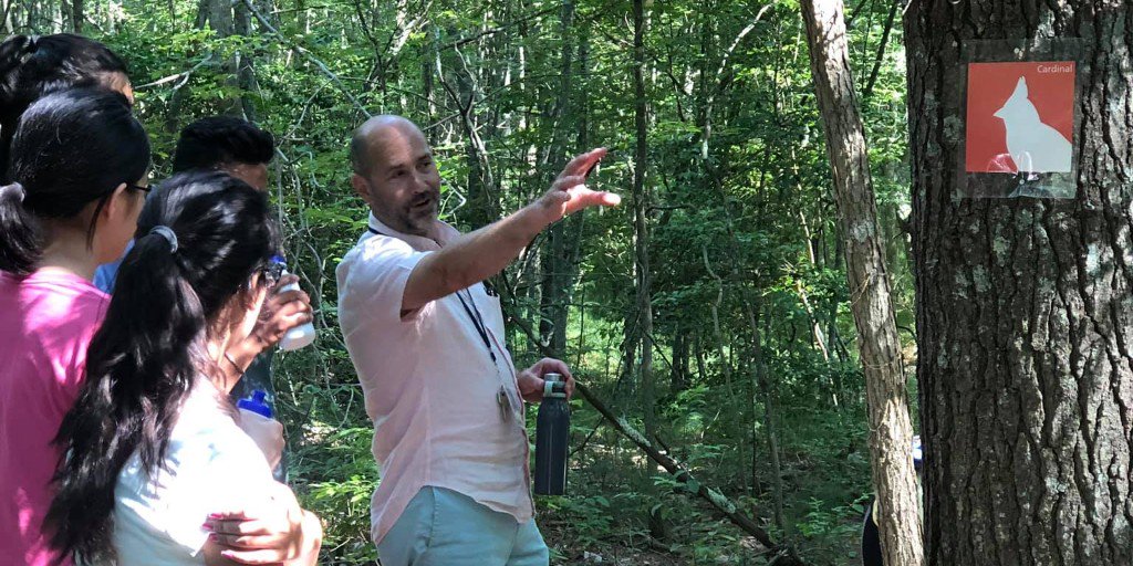 UMassDGSSP's tweet photo. Thank you to Jamie Jacquart, Assistant Director of the Sustainability Initiative @UMassD for hosting our students on a wellness walk last Friday! We got to walk the Red Trail and learn sustainability tips. https://t.co/RhxsN9xXCJ