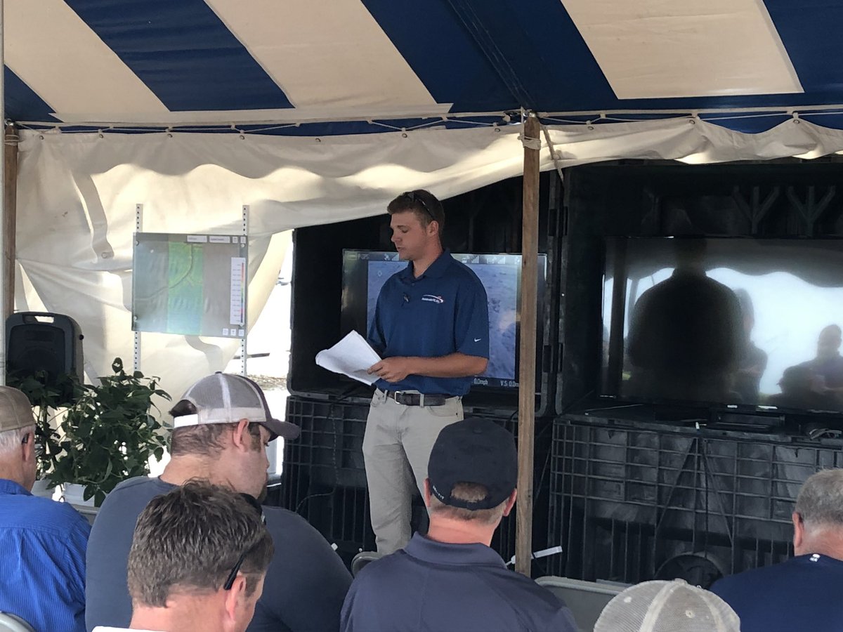 Ryan Harter <a href="/PrairielandFS/">Prairieland FS, Inc.</a> discusses MiField trials with farmers <a href="/FieldInsight/">Johann Landier</a> Day near Winchester.