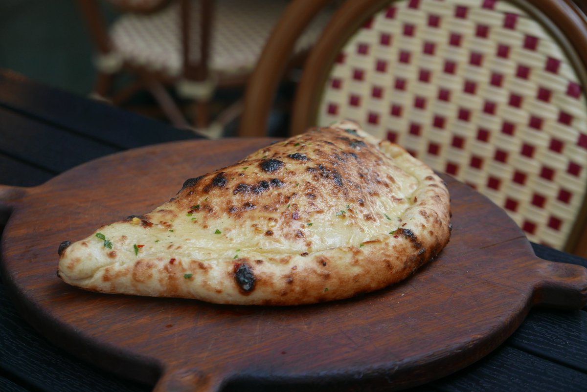 Here it is again our #GuestChefPizza, well, calzone by <a href="/_SocialCompany/">SOCIaL</a>. It contains Datterini tomato, nduja, gorgonzola, silano fior di latte, finished with drizzles of chilli garlic butter - what's not to like! <a href="/HospAction/">Hospitality Action</a> #jasonatherton #nova #victoria