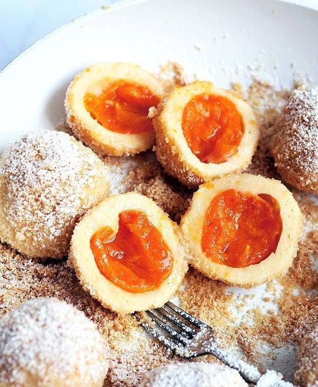 lilviennablog's tweet photo. Homemade Austrian apricot dumplings. This is my favorite dish during summer time. And yes, I eat them as a main, not dessert 😀 My heart skips a beat, every time I cut one these guys open and the fruity, syrupy filling is oozing out. Yass!

Recipe in … https://t.co/oFbbqvtGWK https://t.co/VGpmwgbxYo