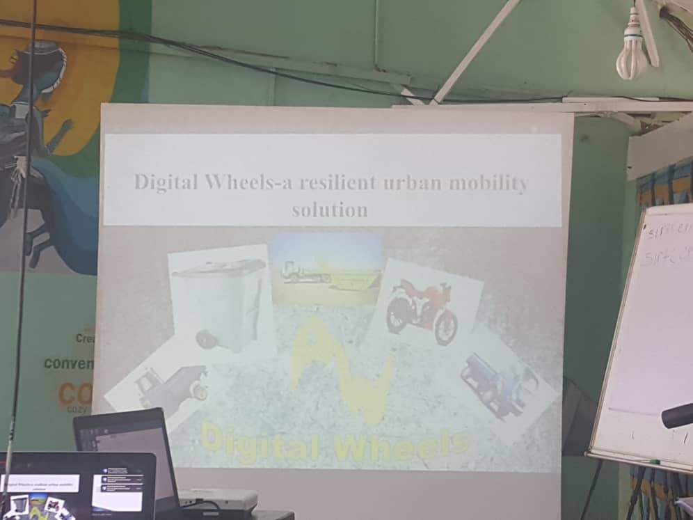 sensihub1's tweet photo. Digital wheels presenting on the use of web and mobile application that uses voice and text systems to report about disaster from different locations in the country.
#DSTI #MoTA #worldbank #gfdrr #Sensitechhub #urbanmobilityhack https://t.co/WQdr6mU0Yu
