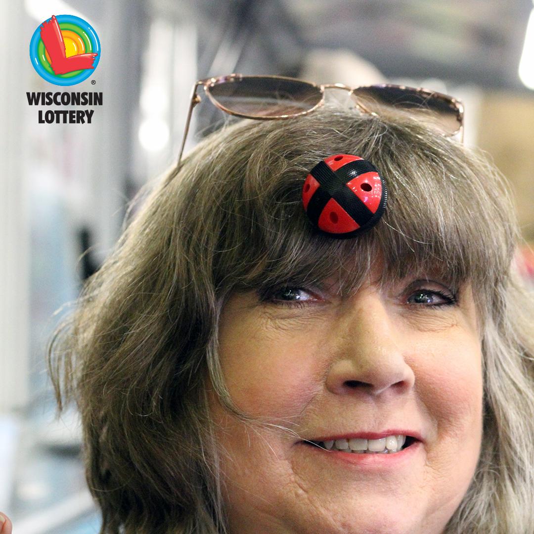 wilottery's tweet photo. Our #WILottery players are fantastic!
This player took a velcro dart to the head and still smiled while waiting in line to get her scratch tickets.
Only in #WINsconsin! #FollowUsToTheFun as you never know what is going to happen! https://t.co/Jj0Fag7YGF