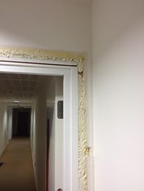 Do any of your fire door frame surrounds look like this? Don't just check the door, check the whole installation. #firedoors #FireDoorSafetyWeek2019