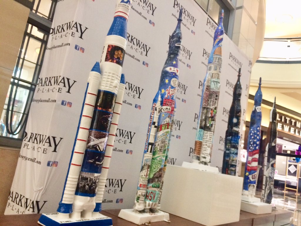 JamesDrewSpace's tweet photo. What kids do for fun in Huntsville: Six awesome models of @NASA_SLS Space Launch System lined up in #BeautifulAlabama’s Parkway Palace #SMDSymposium https://t.co/Ndql6qH4lR