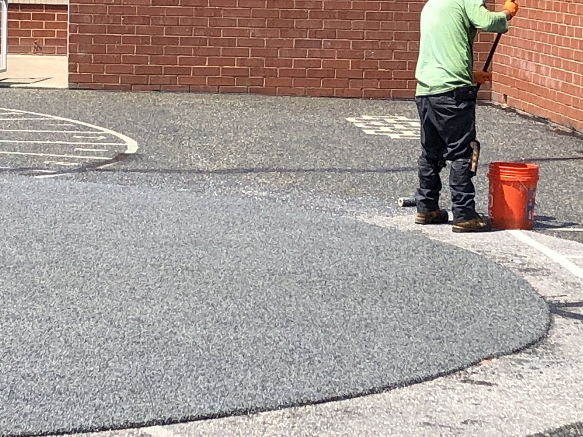 RoundHillES's tweet photo. Rubberizing of the surface on kinder courtyard is underway! #goRHbears #rhes19 https://t.co/kZuinBRJvo