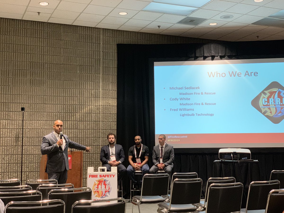 Chelsea_NFPA's tweet photo. Have you ever met a Captain of Community Risk Reduction? I have! Wrapping up the second day at #FRI2019 with Captain Sedlacek and his team, learning about their #CRR initiatives and their use of virtual reality 🤓 https://t.co/MuYSg0W44v