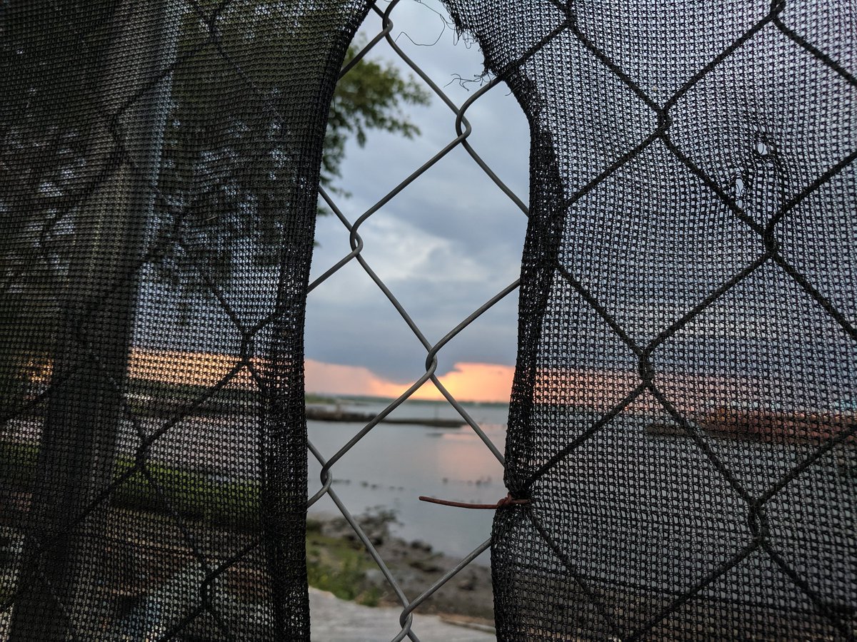 MikeTreglia's tweet photo. So excited for @NYCParks Richmond Terrace Wetlands to open up in a few months. Check out this sunset seen though the fence! #nycwaterfront #openspace #waterfrontaccess https://t.co/rak5eTOlak