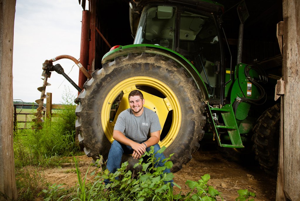 LKPic's tweet photo. When this boy says he wanted to do country pictures I sure wasn't expecting it to be a YEE YEE country session! But I think we could have put him in a landfill and he would still be a little cutie!! 

#lauriekeenphotography #lauriekeenseniors https://t.co/KmSmB35nHB